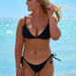 Sustainable swimwear reversible bikini top in black and leopard print on Jess 