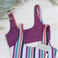 Sustainable swimwear reversible bikini top in wine and stripe flat lay