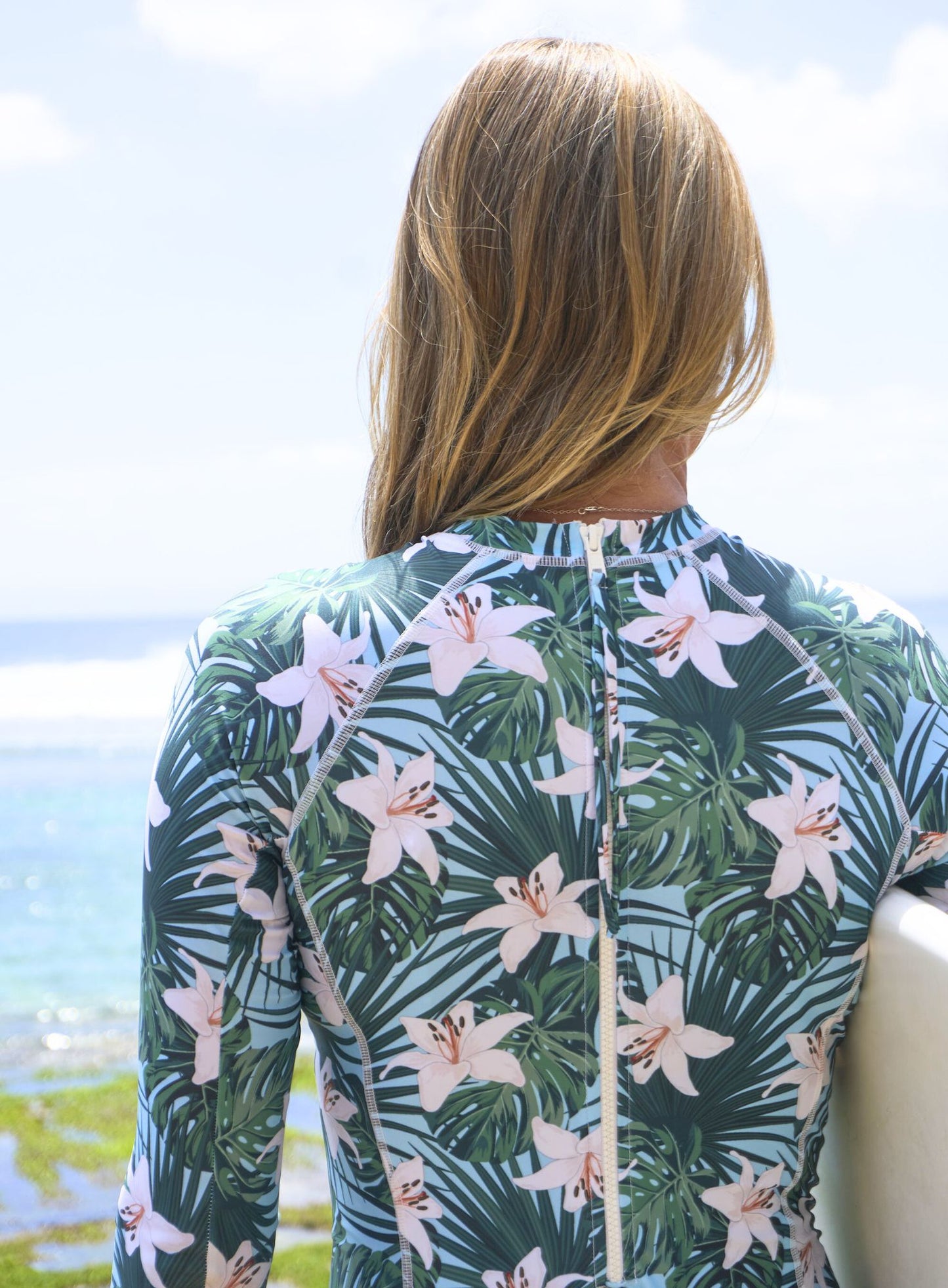 Floral print long sleeve surf suit made from sustainable swimwear material, back close view