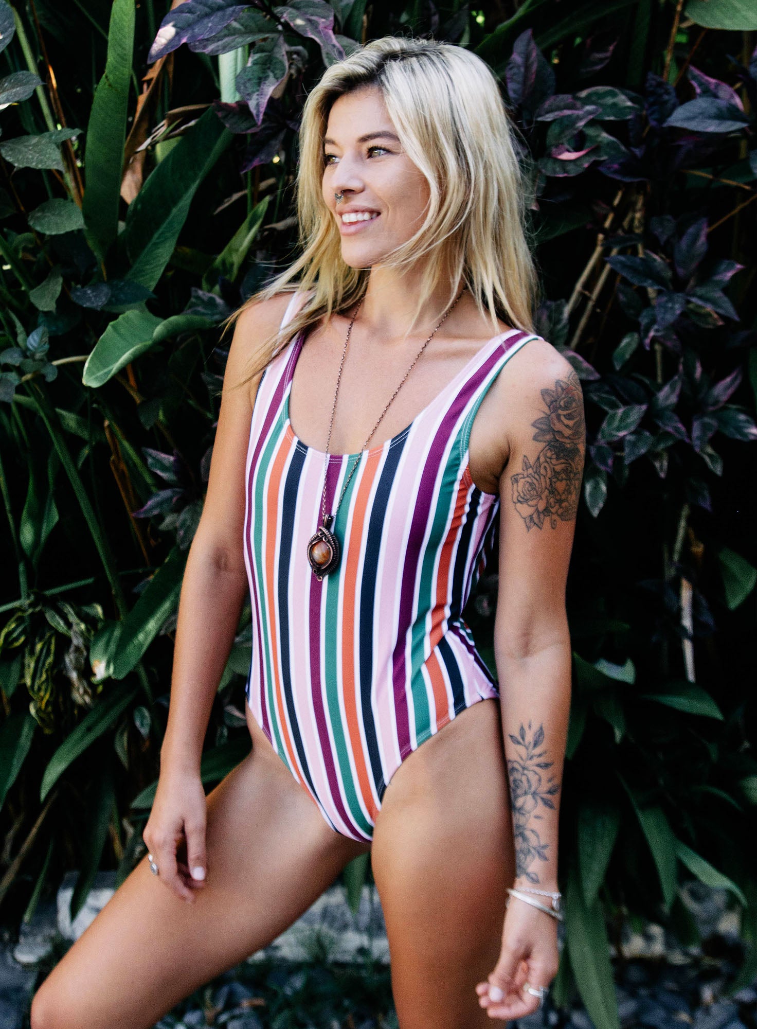 Sustainable stripe one piece swimsuit with high cut leg and full coverage