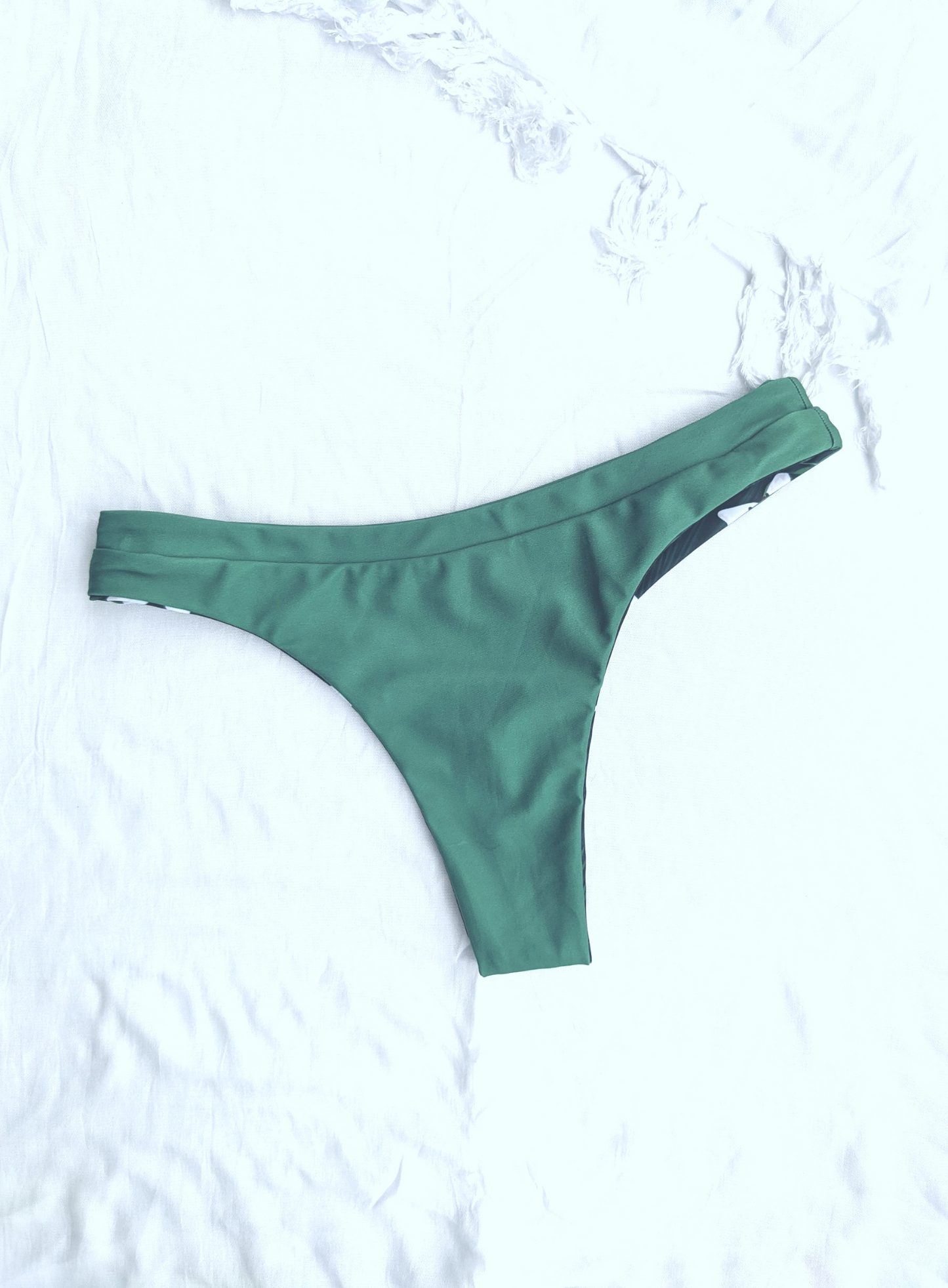 Sustainable reversible green floral skimpy cut cheeky bikini bottom