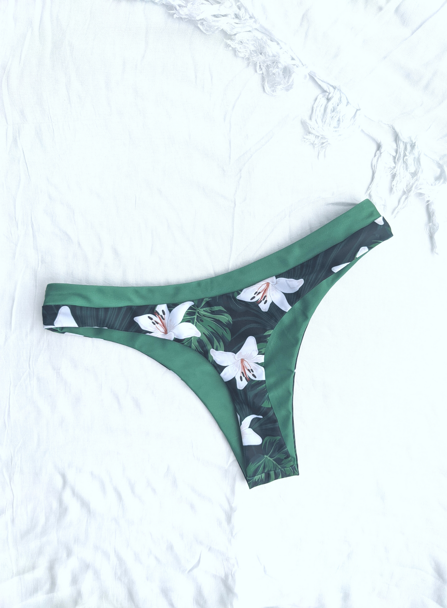 Sustainable reversible green floral skimpy cut cheeky bikini bottom