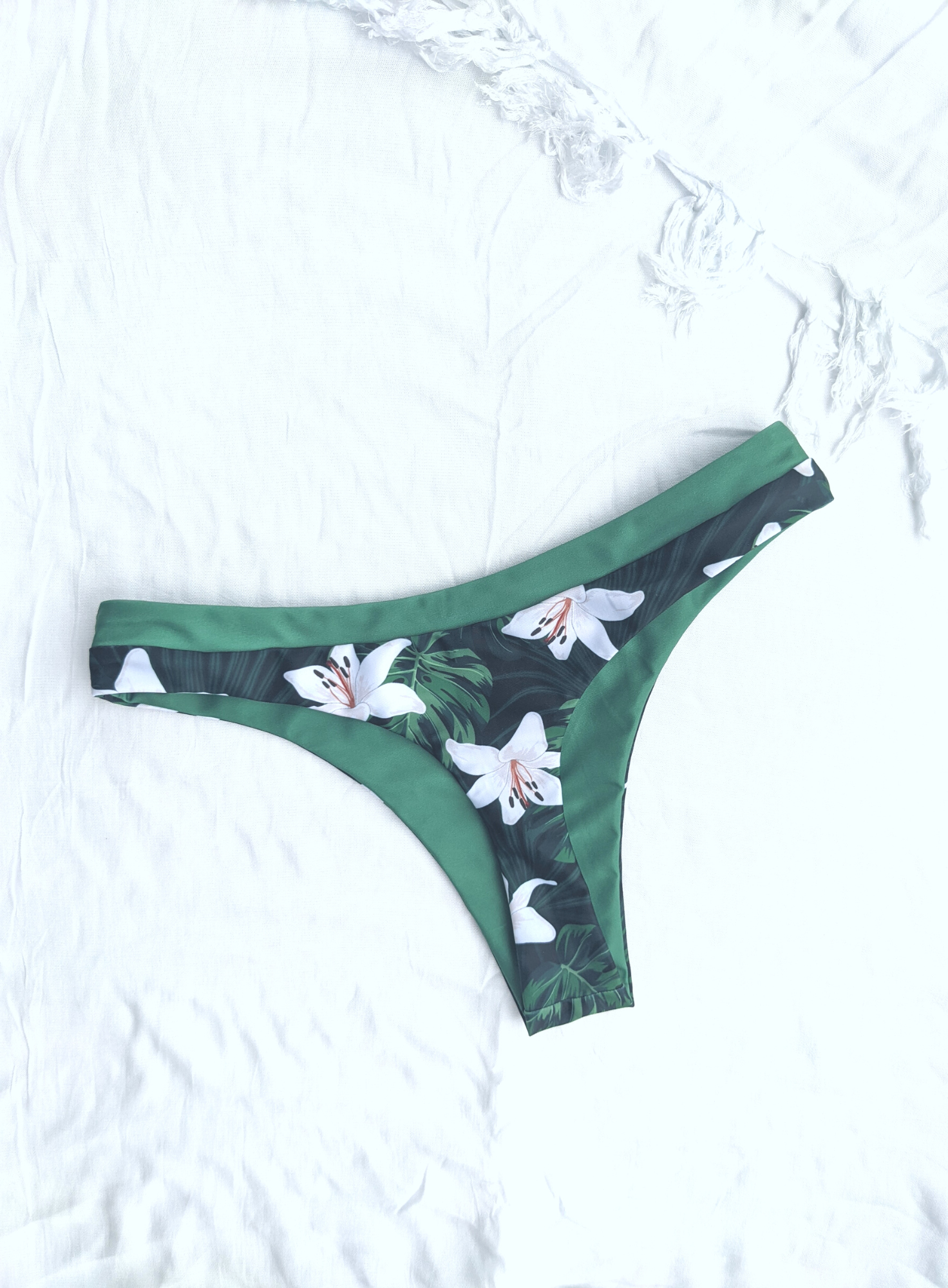 Sustainable reversible green floral skimpy cut cheeky bikini bottom