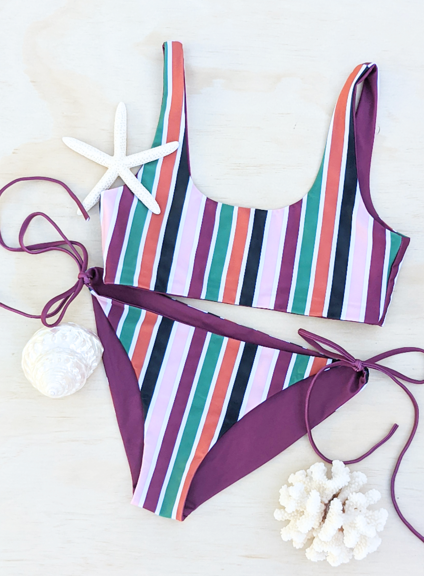 Sustainable reversible stripe tie side classic cut bikini bottom with medium coverage