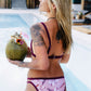 Sustainable swimwear pink floral reversible full coverage bikini