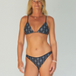 Reversible bikini, string bikini in black and white, with full coverage bikini bottoms made from sustainable swimwear material