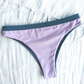 Reversible Blue and Lilac Medium High Cut Bikini Bottom Made From Eco Friendly Recycled Regenerated Fabric Lilac Front Flat Lay View