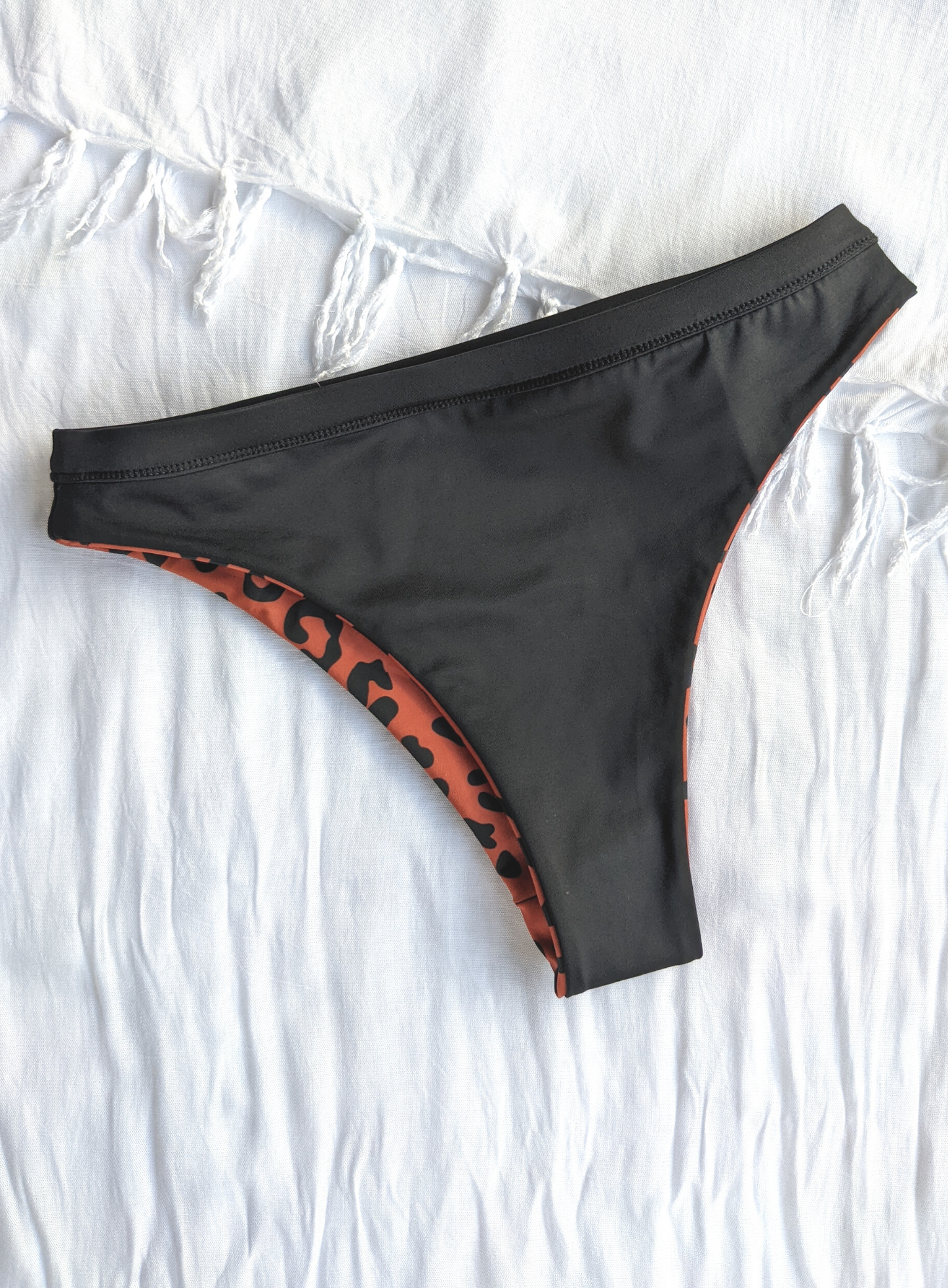 Eco Friendly Reversible Cheeky High Cut bikini In Black And Leopard Print